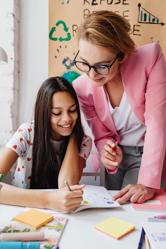why-choose-us A student and teacher working together on homework, learning enthusiastically.